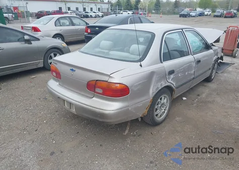 1999 Chevrolet Prizm from USA, damaged, VIN 1Y1SK5280XZ445777